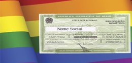 Titulo eleitoral sobre o fundo da beandeira com cores do arco-íris